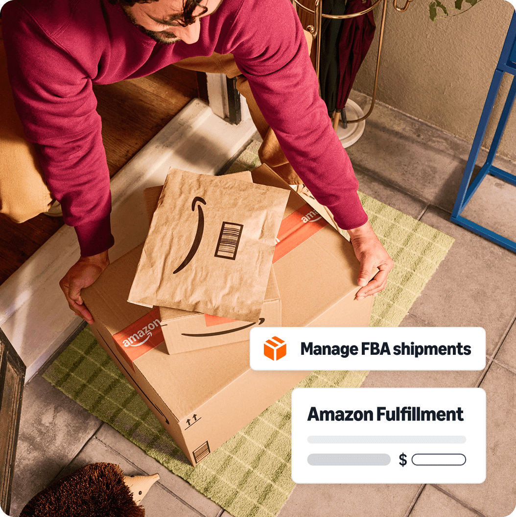 Birds eye view of a man picking up an amazon delivery box on his front step