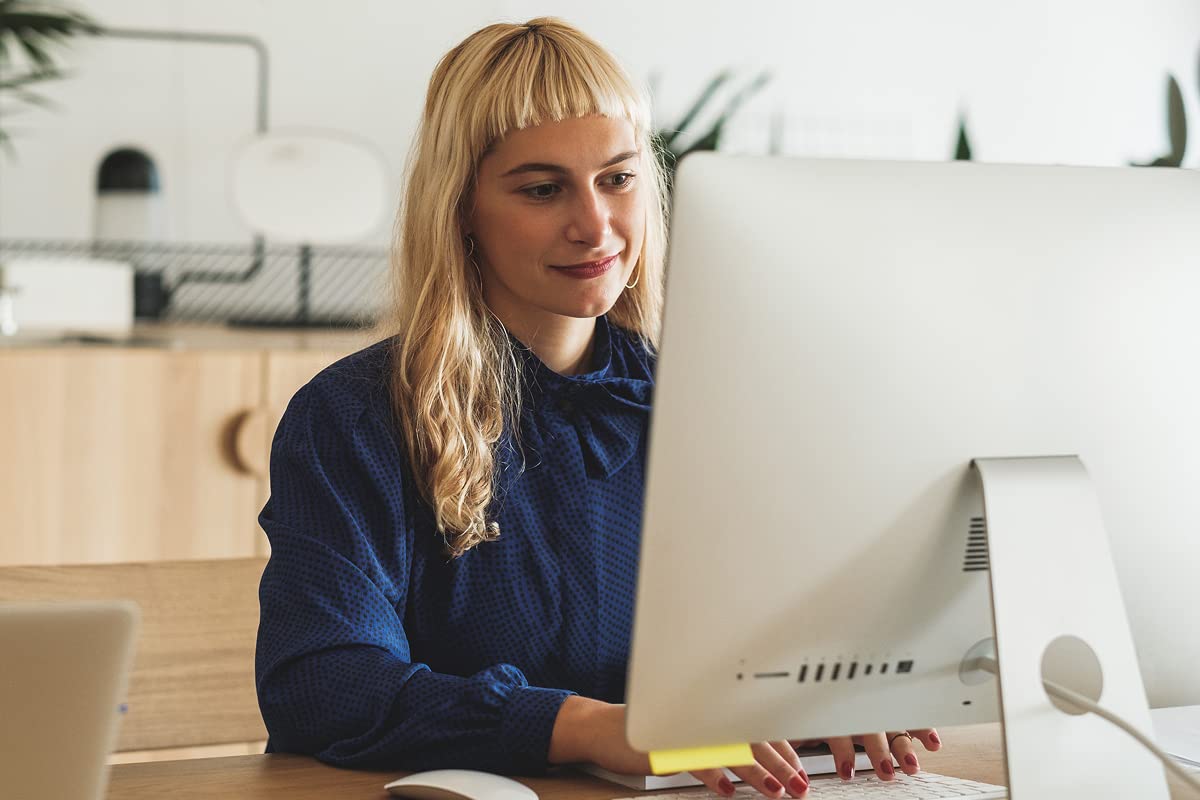 Woman looking at computer screen