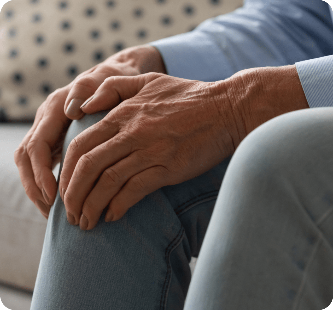 Knee pain Woman holding her knee in pain