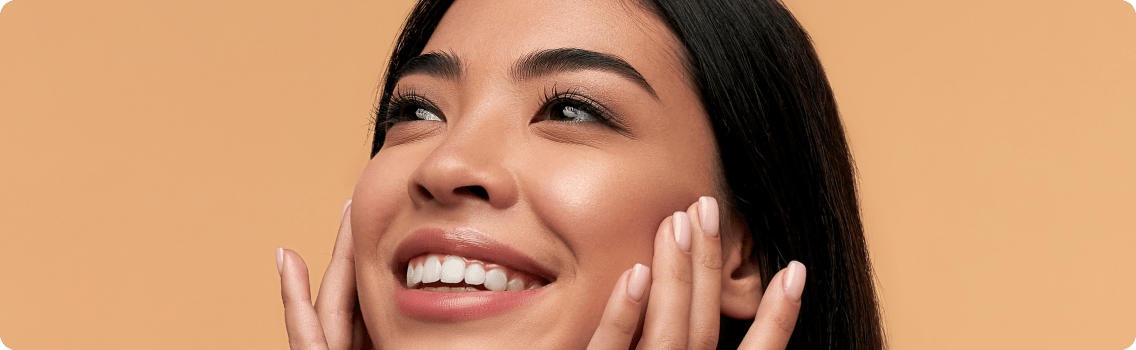 Woman applies tretinoin cream to smooth facial wrinkles