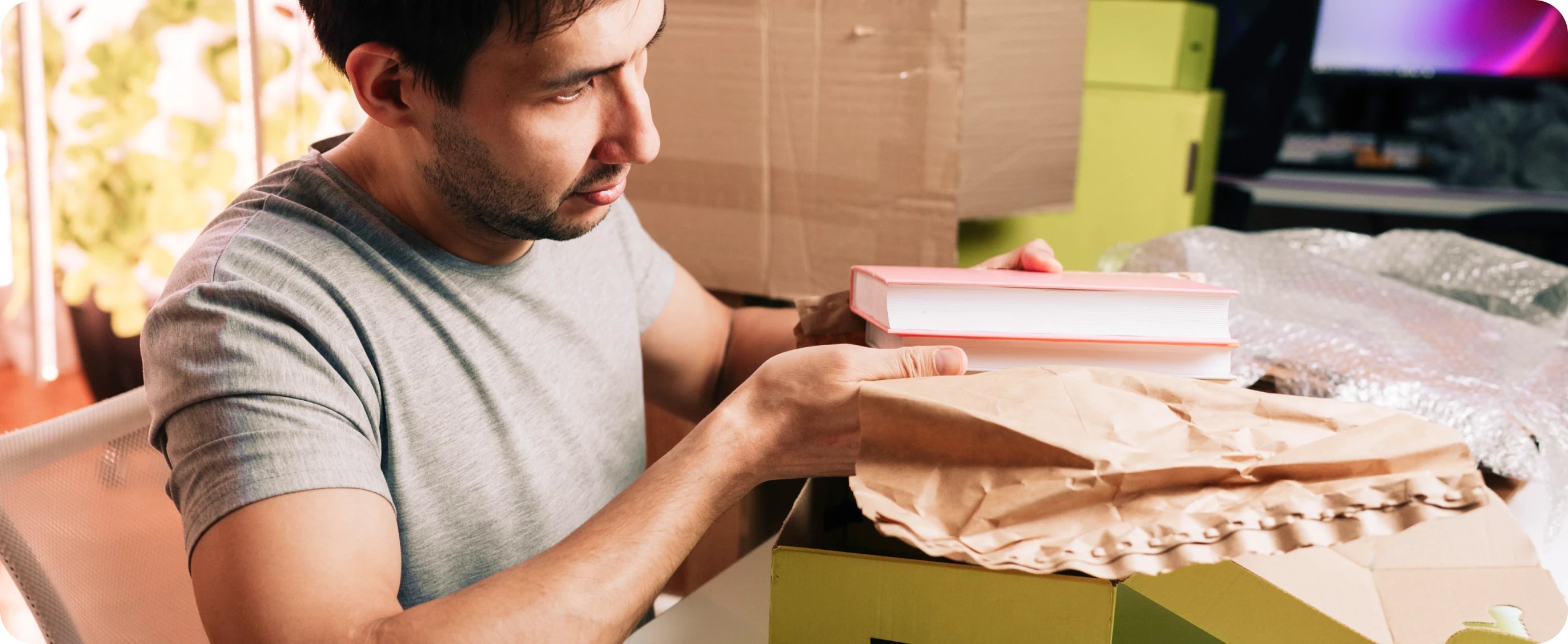 Seller packing books for shipment