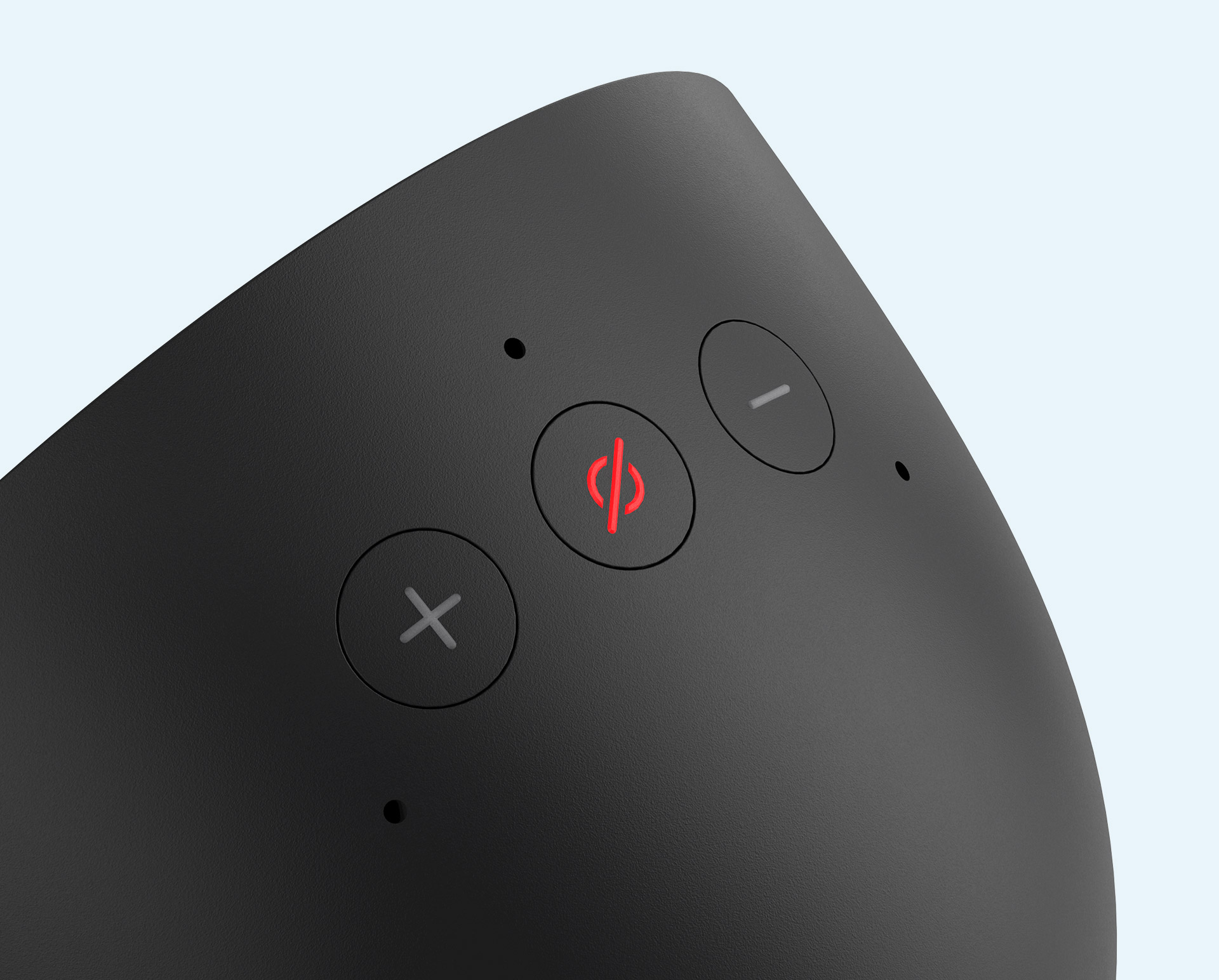 The top of the Echo Spot with a plus-sign volume up button on the left, a mic-off button in the middle, and a minus-sign volume down button on the right.