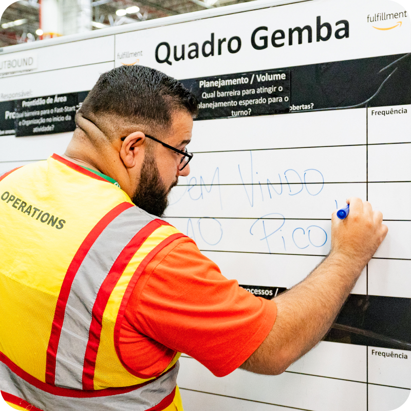 Associate in safety vest at fulfillment center