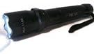 POLICE LED FLASHLIGHT/TASER RIOT IMPLEMENT