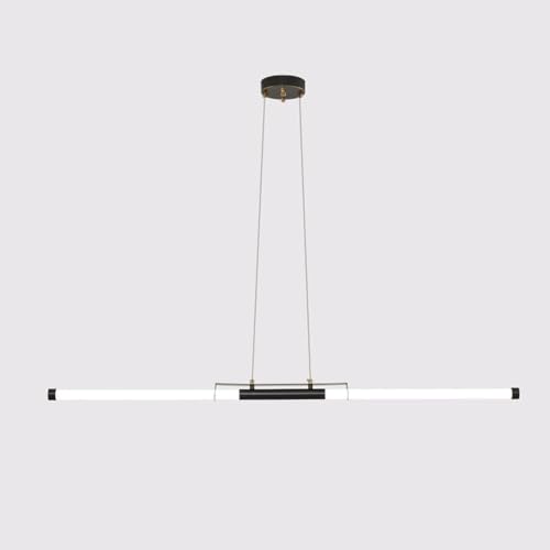 Lustre suspendu au-dessus de la table à manger design acrylique