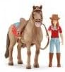 Schleich horse and rider figures.