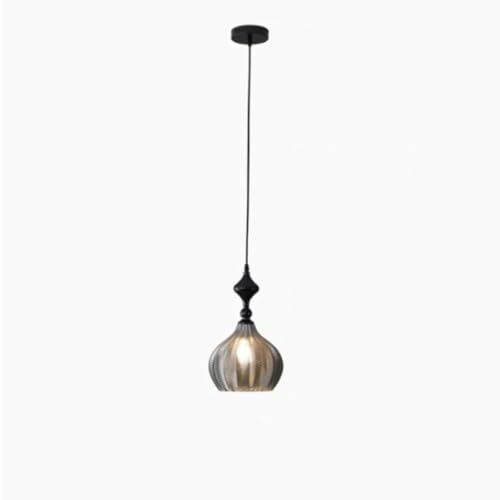 Suspension en verre transparent pour sublimer un îlot de cuisine moderne
