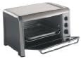 Oster 6057 6-Slice Extra Capacity Toaster/Convection Oven with door open, showing interior racks.