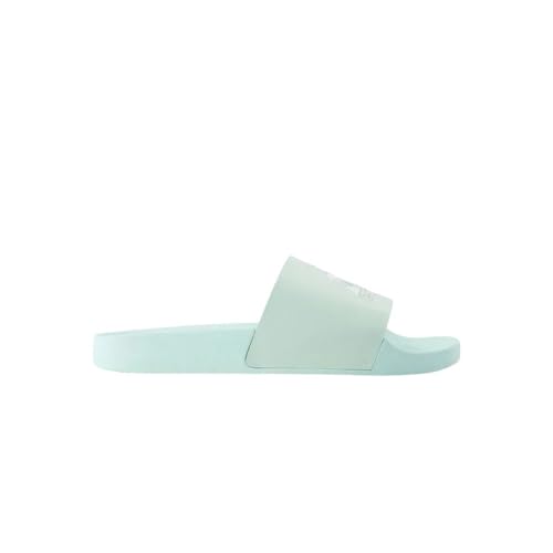 Chanclas Le Coq Sportif de mujer con suela flexible y banda suave verde claro