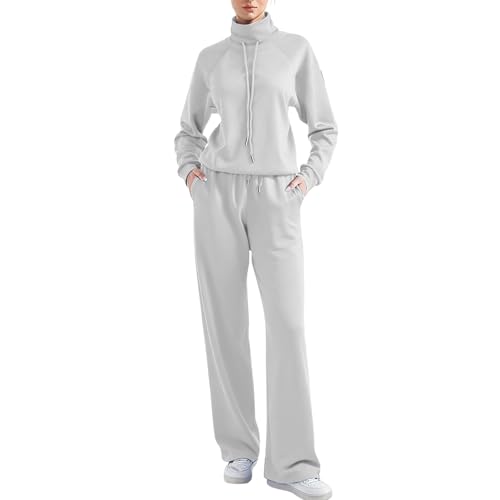 Conjunto de ropa deportiva para mujer que estiliza la figura con pantalón ancho de cuello alto