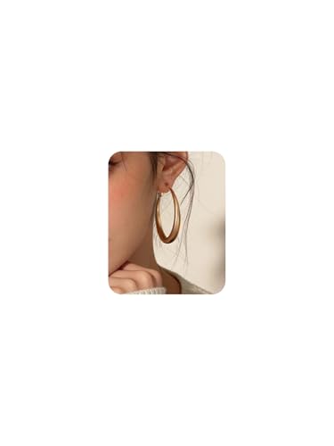 Grandes boucles d'oreilles créoles dorées pour sublimer vos soirées et looks