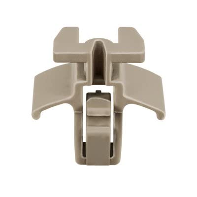 Saddle muffler clamp installed on exhaust pipe