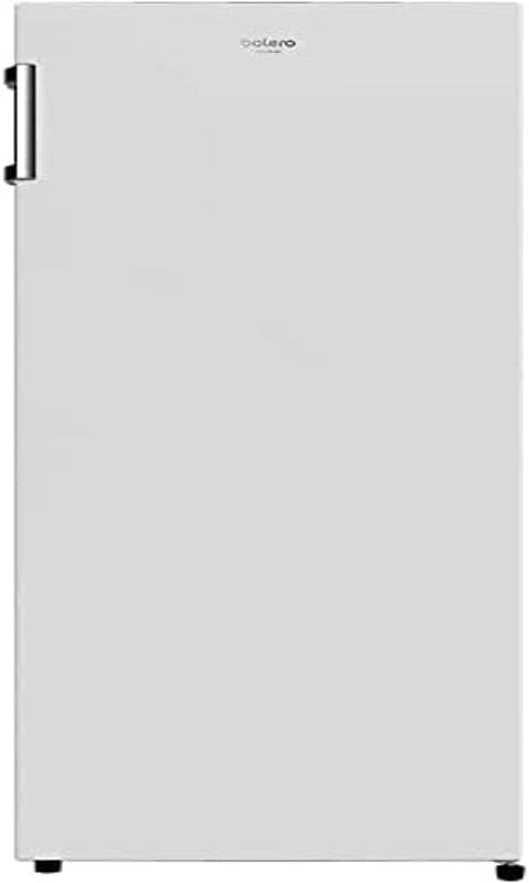 Close-up of the crisper drawer filled with fresh fruits and vegetables