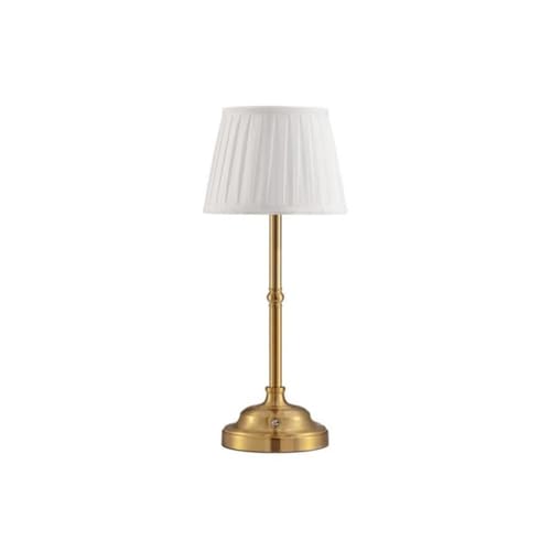 Lampe de table en métal au design épuré et ornement en tissu noble pour intérieur chic