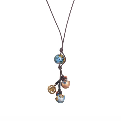 Image of AAKRITI ART CREATIONS Handcrafted Tribal & Boho Ethnic Necklace Collection | Floral, Mandala, Tassel & Dhokra Pendant Designs | Artisan Brass, Wood & Statement Jewelry for Women