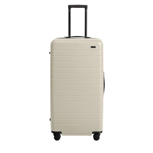 Image of Away Trunk Checked Luggage - 31-Inch Lightweight Hardside Suitcase with 360 WhisperGlide Spinner Wheels, Interior Compression System, TSA-Accepted Lock - Salt White Matte