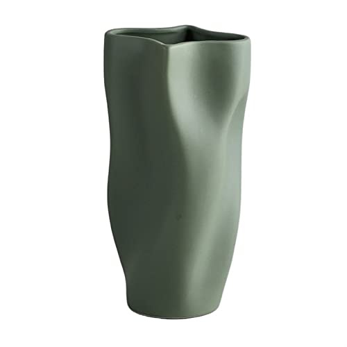 Vase en céramique pour fleurs séchées sur une table basse chic
