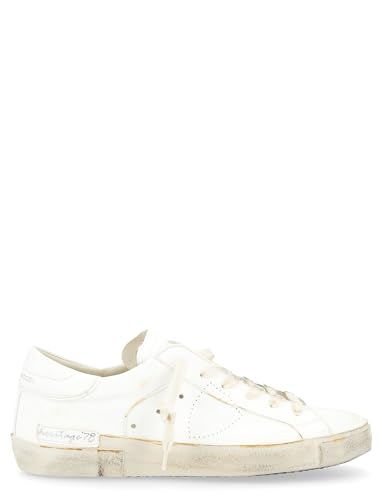 Sneaker da uomo Philippe Model modello Paris X capsule Heritage '78 in pelle bianca. Modello dallo stile street con tomaia in pelle di vitello lavato ruggine con patch personalizzato. La suola con fresature artigianali ed il dettagli used enfatizzano l'effetto vissuto del design. Talloncino logato Scudetto traforato Chiusura con lacci sporcati Fasciatura laterale asimmetrica realizzata artigianalmente Finitura used spazzolata Fodera interna in pelle e spugna di cotone Suoletta interna estraibile di 1 cm Suola in gomma di 2,5 cm