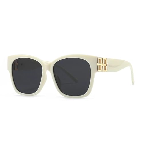 Lunettes de soleil œil de chat au design rock blanc moderne et monture graphique