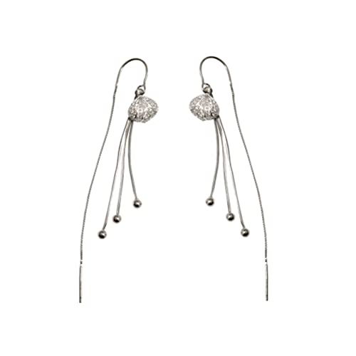 Boucles d'oreilles coquillage à longs pompons pour sublimer vos tenues d'été et de vacances