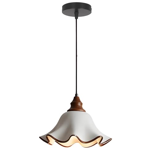 Suspension céramique blanche ondulée pour illuminer chaleureusement votre salle à manger
