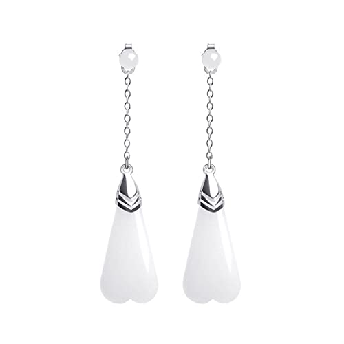 Boucles d'oreilles argent rétro pour sublimer une tenue terne avec un pendentif fleur