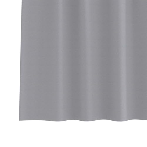 Rideaux occultants gris pour tamiser la chambre et créer une ambiance cocooning au salon