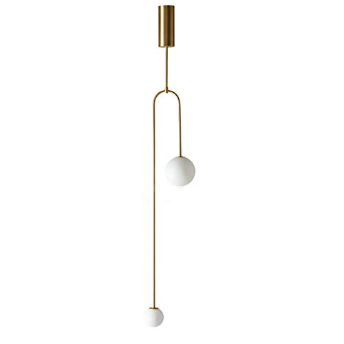 Lampe suspendue dorée pour éclairer un îlot central sans éblouir