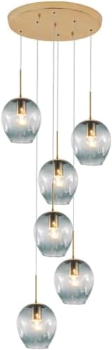 Suspension escalier en verre pour sublimer votre cage d'escalier lumineuse