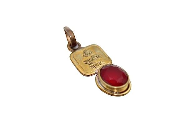UROOHDivya Spiritual Dharmsaar Stone Studded Surya Yantra Locket, Pure Red Stone Surya Yantra Pendant Brass Made for men and women, Energised Manikya Patthar Small locket (without chain) for daily use,