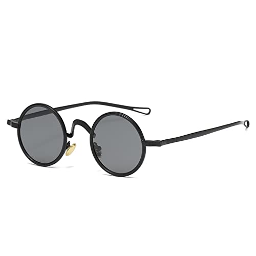 Lunettes de soleil femmes à cadre rond en métal de qualité