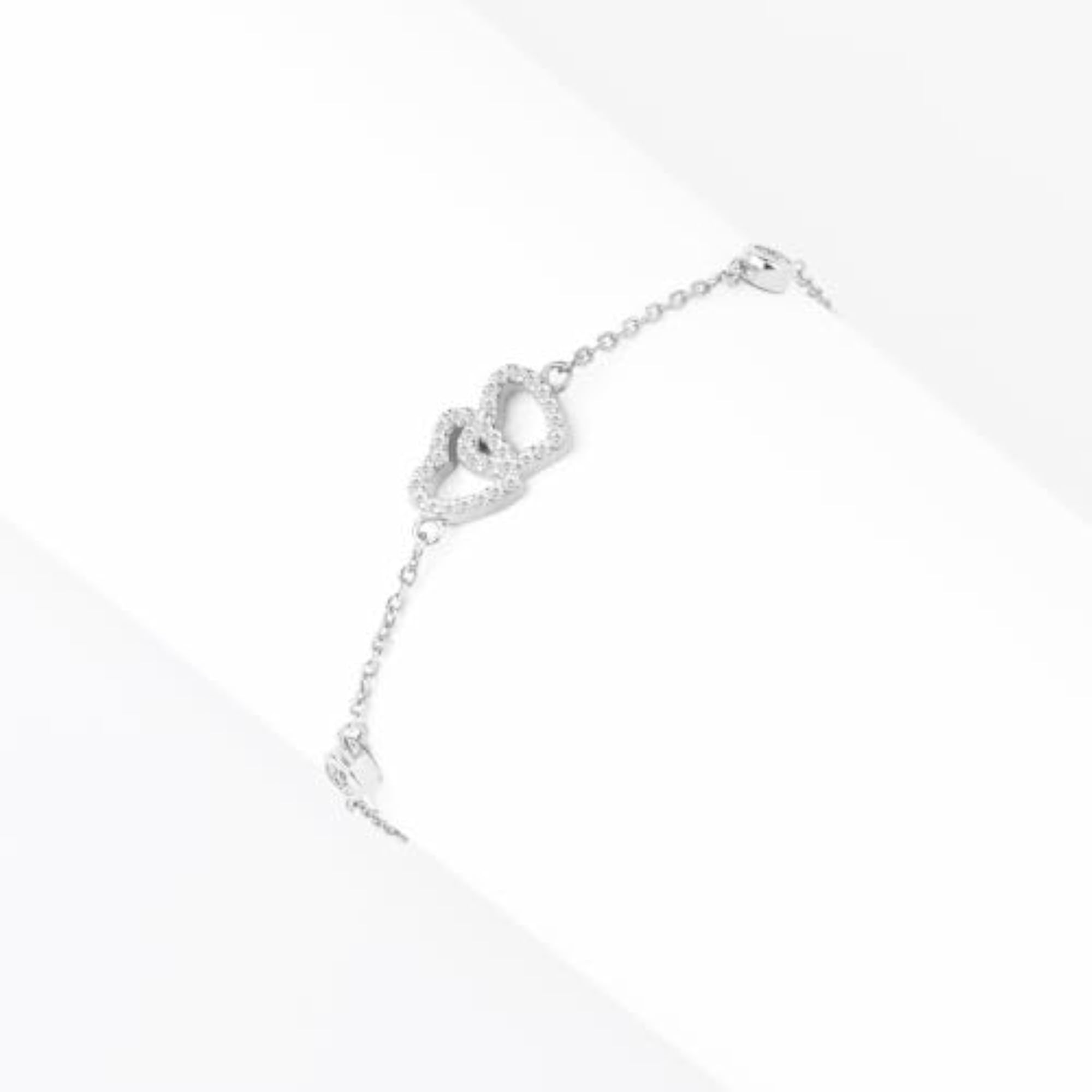 Women's 925 Sterling Silver Interlocked Hearts Bezel CZ Bracelet