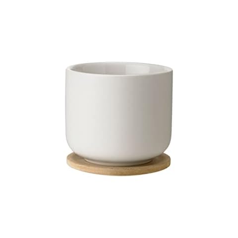 Stelton Theo - Taza de té con plato, color arena Cover