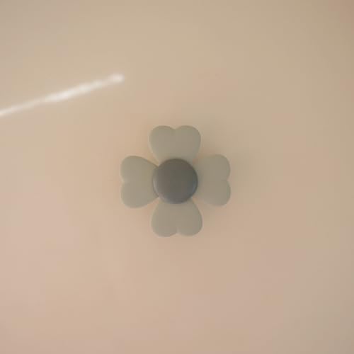 Image of mushie Lucky Suction Spinner Toy | Toddler Sensory Toys for Bath & Play