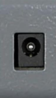 Close-up of a barrel connector port