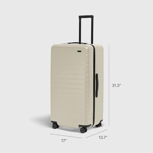 Image of Away Trunk Checked Luggage - 31-Inch Lightweight Hardside Suitcase with 360 WhisperGlide Spinner Wheels, Interior Compression System, TSA-Accepted Lock - Salt White Matte