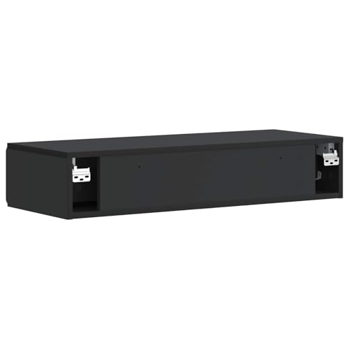 Mesa de pared de madera con cajón negro que optimiza espacio en salones modernos 8