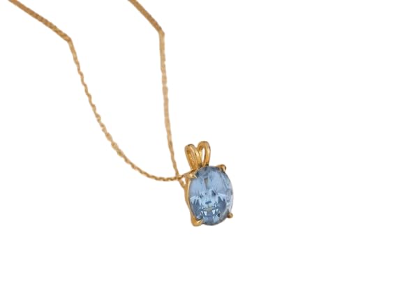 Pendentif topaze bleu ciel, le bijou de vacances idéal en argent doré