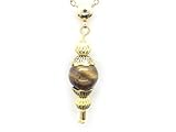 Ce collier vous séduira par son style vintage, bijoux anciens