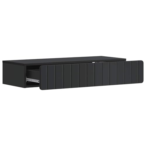 Mesa de pared de madera con cajón negro que optimiza espacio en salones modernos 5