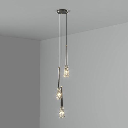 Lustre suspendu minimaliste pour ambiance feutrée de chambre