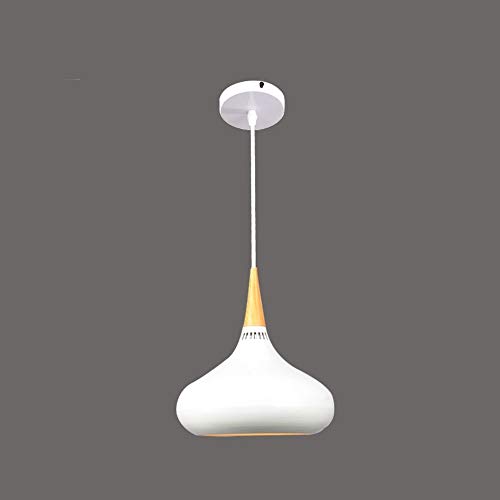 Luz colgante industrial para crear un comedor vintage y calido