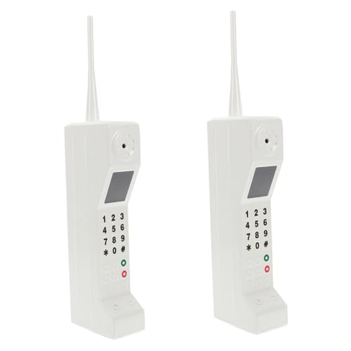 Téléphone portable rétro blanc pour réussir une décoration vintage authentique sans effort