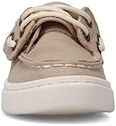 Amazon.com | Sperry Unisex-Child Sea Ketch Jr Washable Boat Shoe | Athletic A boat shoe with a beige upper and white sole. It has a lace-up closure and a rubber sole.