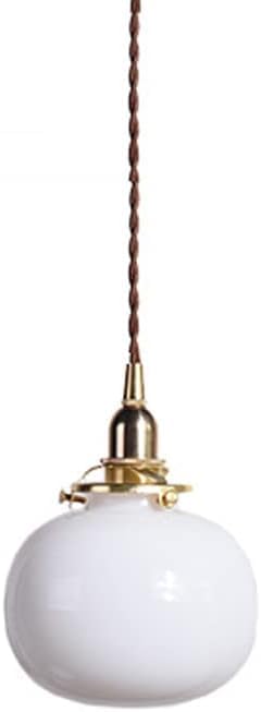Lustre en métal doré en verre bleu pour illuminer un salon sombre