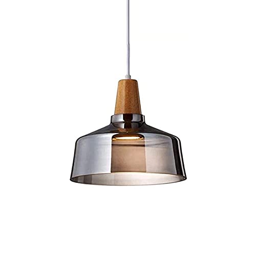 Plafonnier en verre et bois pour illuminer chaleureusement votre salle à manger