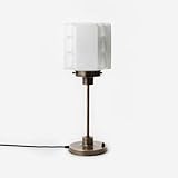 Lampe luxueuse en bronze avec finition élégante.