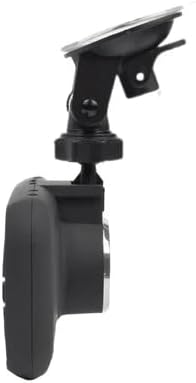 Strana view of the dashcam mounted on a windshield, showing the compact profile.
