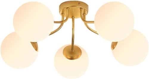 Plafonnier doré design scandinave pour illuminer votre salon cosy