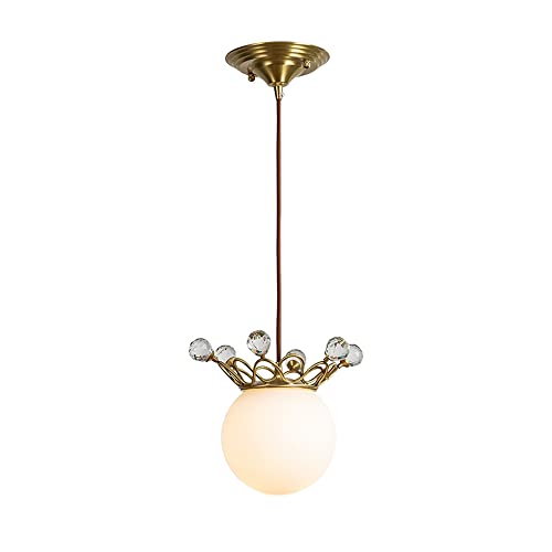 Lustre en cristal en laiton moderne pour créer un cocon doux près du lit